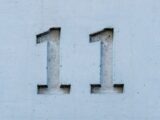 a number one on the side of a building