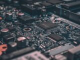 macro photography of black circuit board